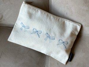 Take A Bow Toiletry Bag
